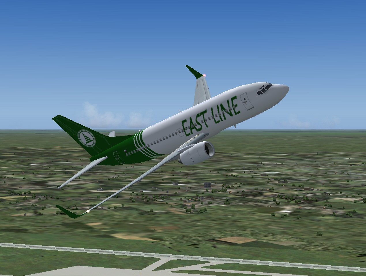 Tsutomu Urakawas Boeing 737-700 In Eastline Livery With Two Aircraft; Regular Wings, And W