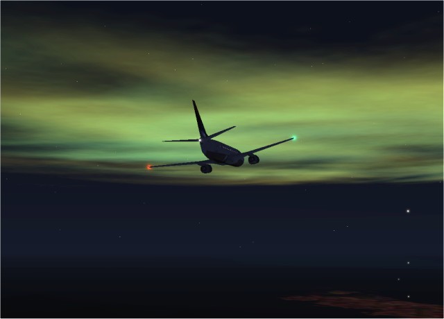 REAL AURORA in FS2K2. Delta 737 near Anchorage Alaska silloetted against the Aurora.  This is as real as it gets! (is this an easter egg?) Note the AI traffic on the lower right. - Photo 155