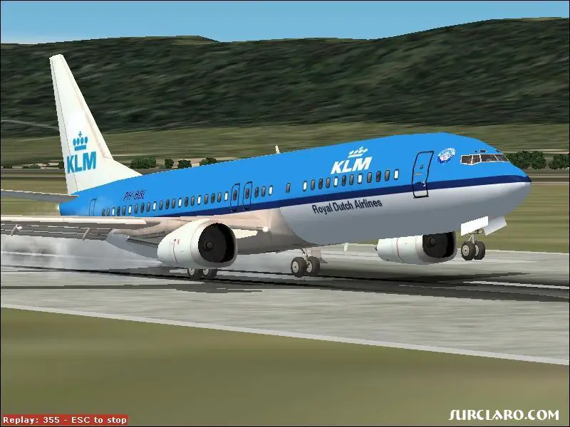KLM Boeing 737-400 touching down runway 5 of Geneva Intl. Airport. - Photo 5071