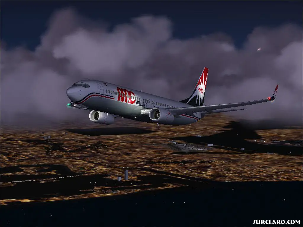 AMC 738 after takeoff from KSAN - Photo 15353