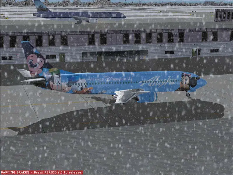 B737-400 alaska in Special livery siting at the gate. Happy New Year to Everyone!!!  - Photo 4075