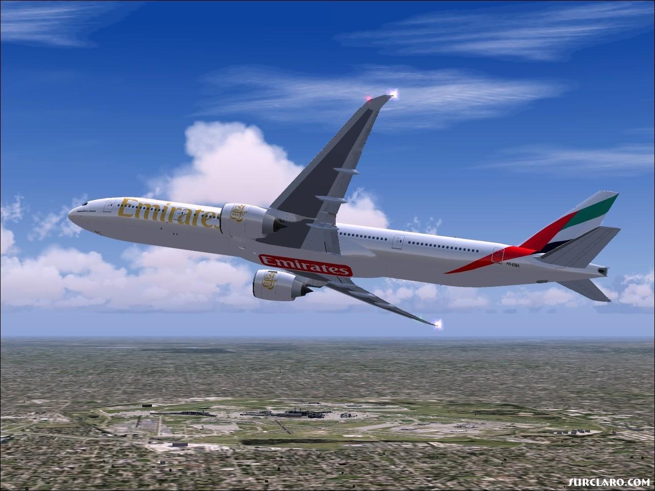 The Emirates 777-300ER leaving Chicago-O'Hare Intl. for Abu Dhabi.......  - Photo 7388