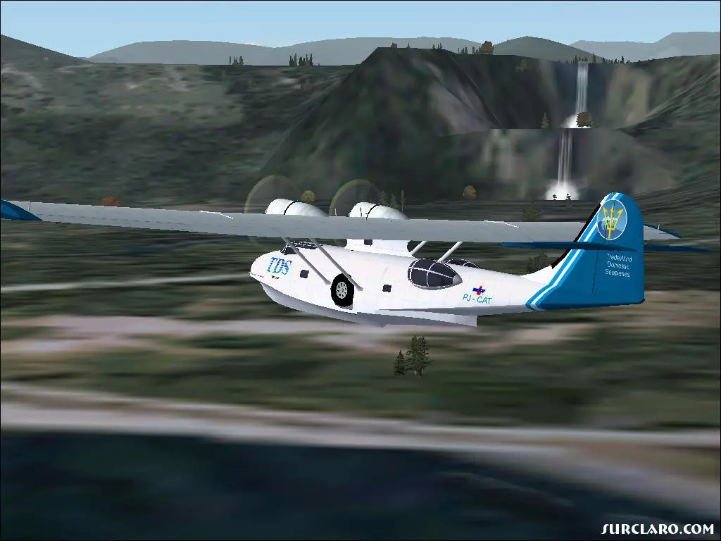 Here is a Consolidated PBY Catalina flying by the waterfall near Emma field(LAGO) - Photo 5733