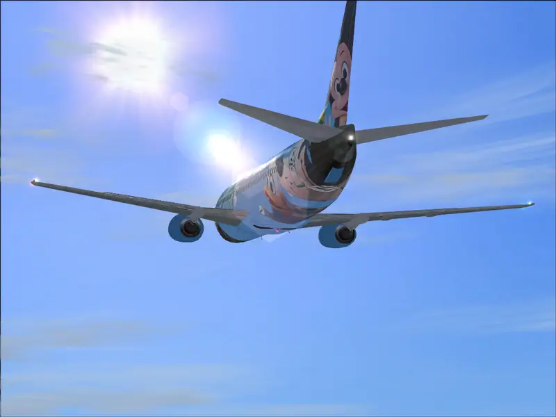 The sun is shining on my plane. Happy New Year to everyone and all simmers and have a happy 2004!!! :-) - Photo 4073