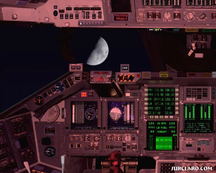 A shot of the moon through the Shuttle cockpit - Photo 2897