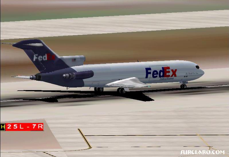 FedEx 727 takes off from LAX on runway 25R.  - Photo 2791